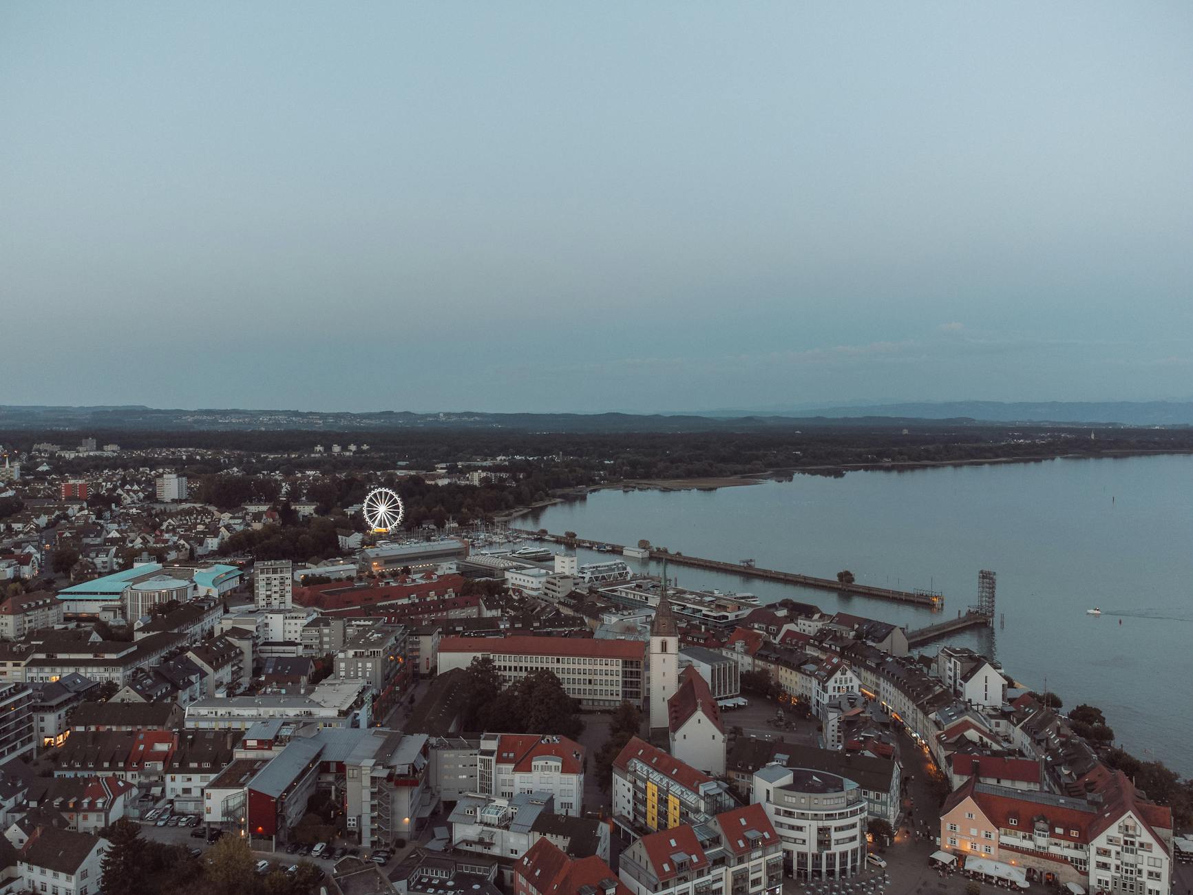 Scenic aerial view of Friedrichshafen city with Lake Constance in the early morning light.