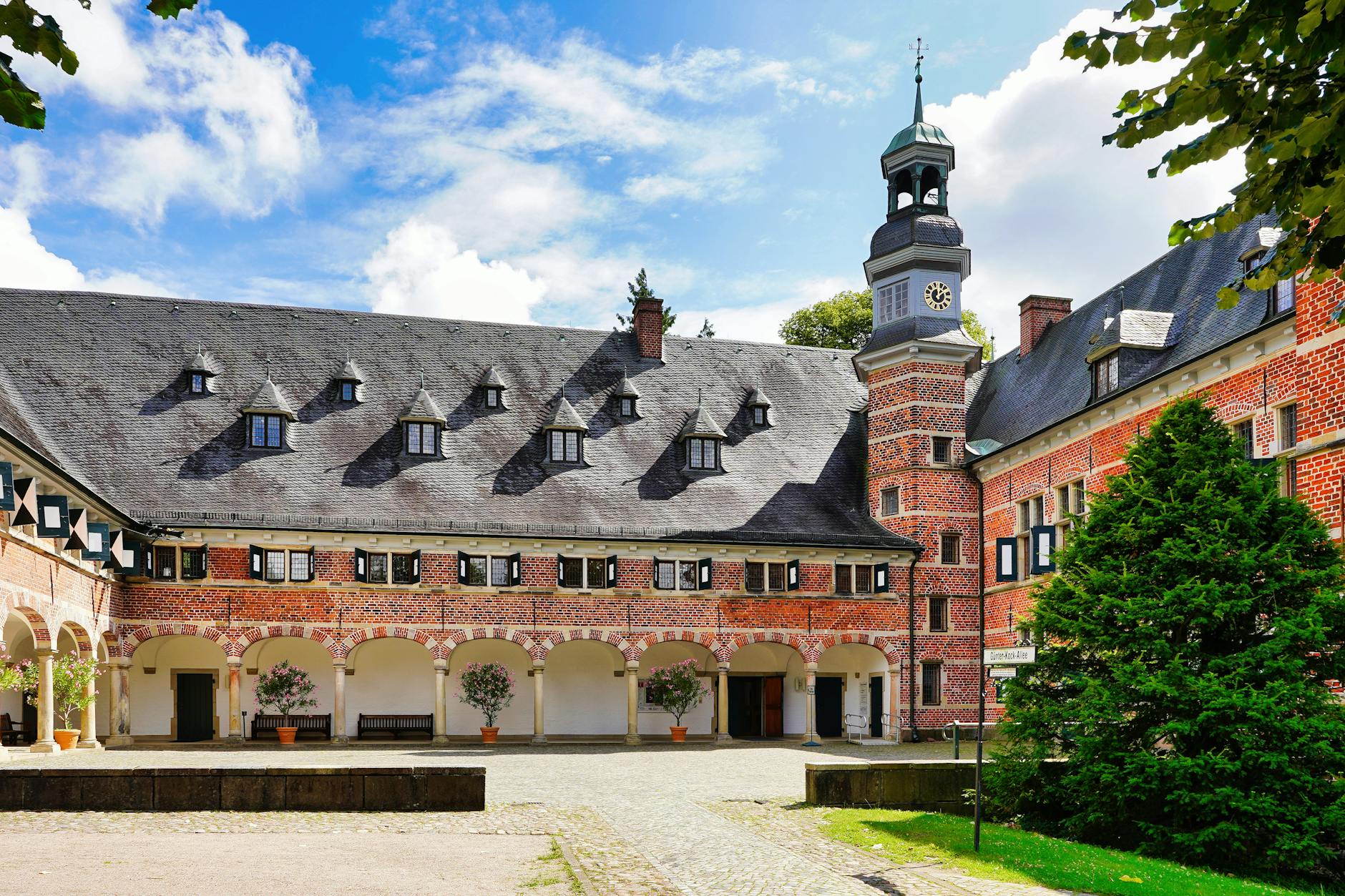 Explore the historic Reinbek Castle with its charming courtyard in Schleswig-Holstein, Germany.