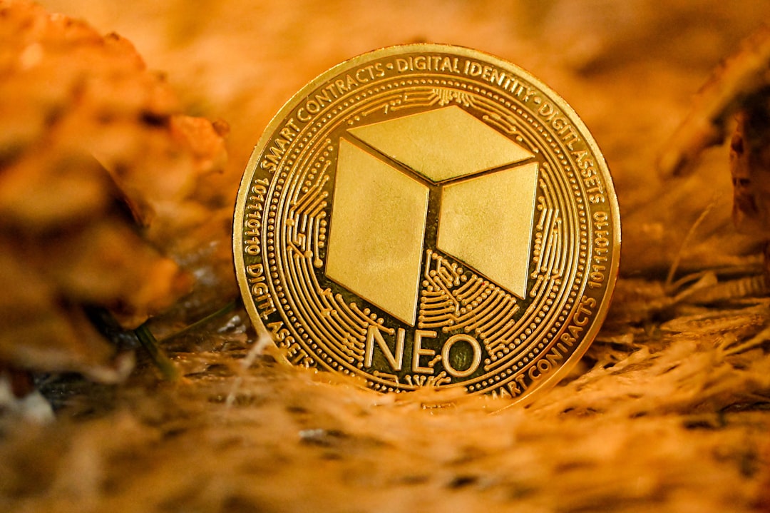 a gold coin sitting on top of a pile of dirt