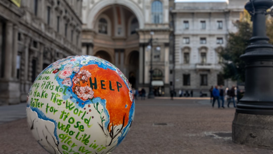 a close up of a football ball in front of a building
